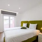 M J House *